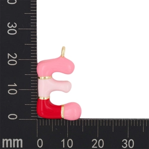 Macro shot showing dimensions of a pink enamel letter E pendant with gold plating