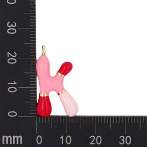 Detail view of pink enamel bubble letter K pendant showing 23mm height measurement