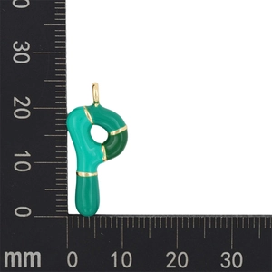 Detail view of green enamel letter P pendant showing 25mm height on scale ruler