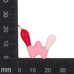 Detailed measurement showing pink bubble letter W pendant width and height on scale