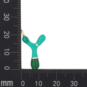 Macro shot of green enamel letter Y bubble pendant showing 25mm size on a scale ruler