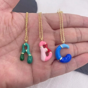 Colorful bubble letter A B C enamel pendant necklaces with gold metal edge on a chain