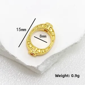 Détail macro d'une perle intercalaire en alliage doré 15mm avec dimensions et poids