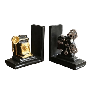 Vintage camera and projector bookends in black resin for retro office shelf decor