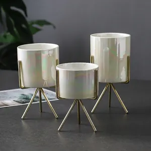 Three-piece set of pearlescent ceramic succulent pots with golden metal tripod stands