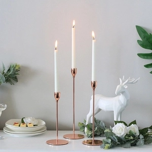 Set of 3 minimalist rose gold pillar candle holders for elegant dining table decoration