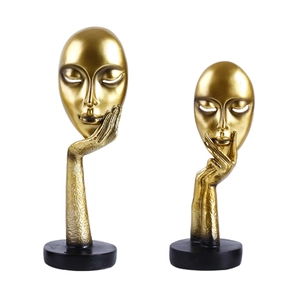 Ensemble de sculptures de visage abstrait doré avec base noire pour décor nordique