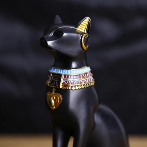 Artistic black resin Egyptian Bastet cat statue with golden ornaments and candle holder decor
