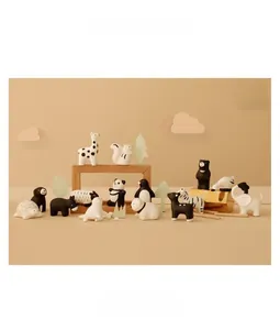 Miniature ceramic animal figurines including giraffe and panda for cute desktop home decor