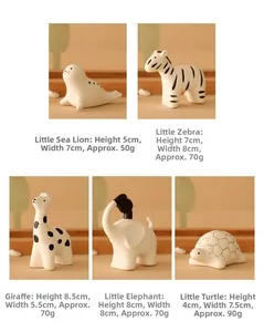 Detailed views of matte white ceramic animal figurines with minimalist hand-painted patterns