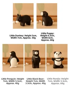 Detailed dimensions of minimalist black and white ceramic animal figurines for tabletop