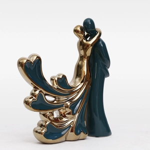 Modern Nordic green and gold ceramic couple statues with abstract minimalist heart design