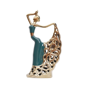 Nordic luxury peacock dancer ceramic ornament in deep blue with golden cutout details