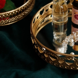 Nordic gold metal mirror tray with heart-shaped cutout pattern for jewelry storage