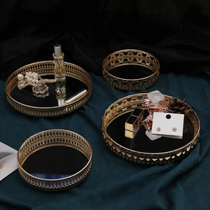 Nordic luxury gold round mirrored vanity tray with hollow pattern for jewelry storage