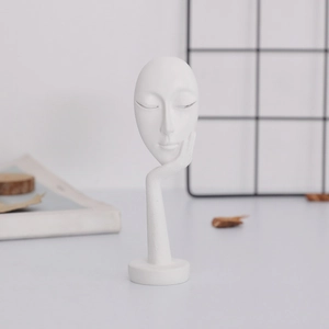 Modern minimalist white resin abstract face sculpture for elegant home office desk decor