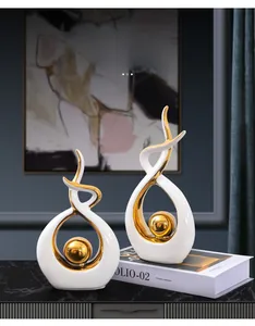 Detail of luxury white and blue ceramic ornaments with electroplated gold accents