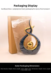 Abstract blue and gold ceramic sculpture shown with its protective box and PE packaging