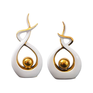 Modern abstract ceramic sculptures in white and gold for luxury home living room decor