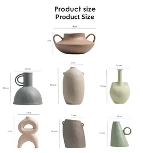 Size chart showing dimensions for various Nordic ceramic vases in diverse artistic shapes