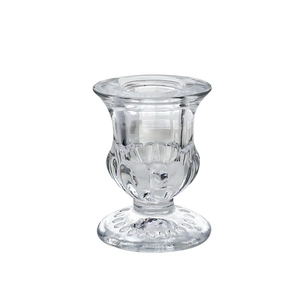 European minimalist transparent glass candle holder with vintage embossed details