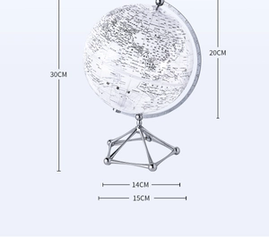 Detail showing transparent 20cm globe sphere with silver tripod metal base stand