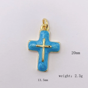 Detailed view of sky blue enamel cross pendant with gold plating and 20mm height dimensions