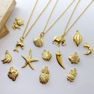 Golden plated mini pendant set with moon animal and fruit shapes for DIY jewelry making
