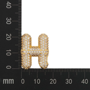 Detailed measurement of gold H letter pendant with cubic zirconia, sized 23x20mm