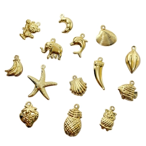 Golden plated brass mini charms set featuring moon and animal shapes for DIY jewelry making
