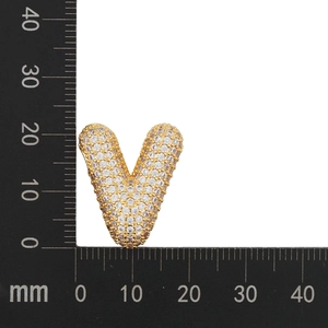 Macro detail of gold-plated V-shaped balloon pendant with cubic zirconia inlay, size 24x21mm