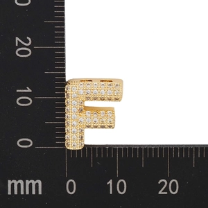 Detailed size measurement of a gold letter F pendant paved with cubic zirconia stones