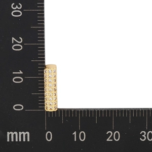 Macro shot of gold rectangle pendant with cubic zirconia stones showing 13mm scale