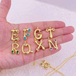 Gold plated alphabet necklace pendants with colorful zircon stones in a teardrop design