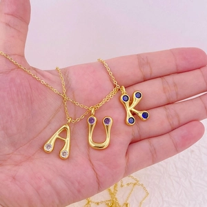 Gold plated colorful zircon alphabet pendants A, U, K on elegant thin metal chains