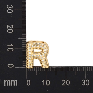 Detailed measurement of a gold zircon-inlaid letter R pendant showing 16mm height