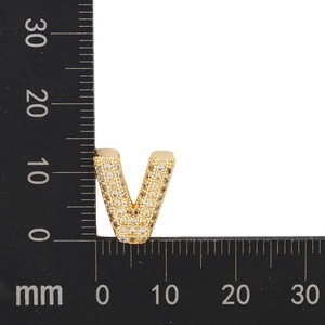Macro shot of gold V pendant with micro-pave cubic zirconia measuring 14mm in height