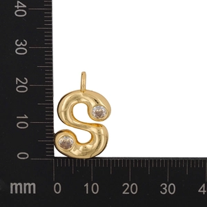 Macro detail of gold-plated S-shaped letter pendant with zircon stones and size scale