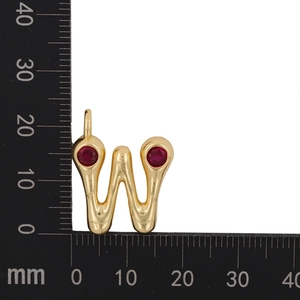 Macro detail of a 15mm gold-plated W letter pendant with red cubic zirconia stones