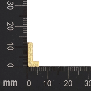 Macro view of gold letter L pendant showing 10mm size measurement and dotted texture