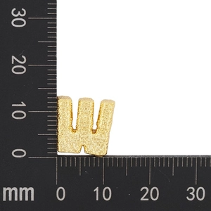 Detail of 12mm gold-plated letter W pendant with hammer texture and measurement scale