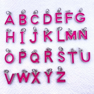 Set of 26 pink enamel alphabet pendants with silver metal edges for DIY jewelry making