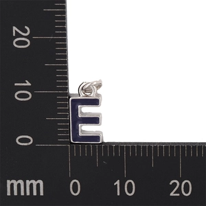 Detail view of 10mm silver letter E pendant with purple enamel for DIY jewelry