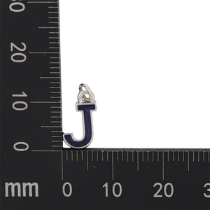 Detail view of silver letter J charm with blue enamel showing 13mm size on a ruler