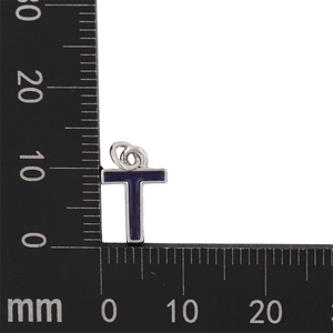 Detail of blue enamel letter T pendant showing precise 10mm size measurement on a scale