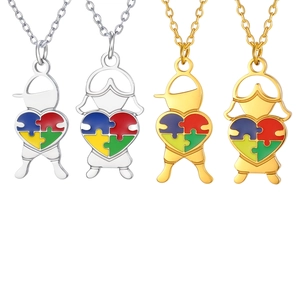 Colliers en acier inoxydable avec pendentif cœur puzzle autisme en finitions or et argent