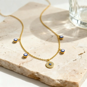 Collar Evil Eye retro de acero inoxidable bañado en oro de 18K con cristales azules sobre piedra