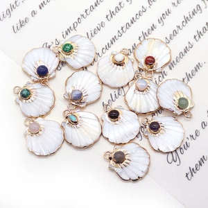 Scallop shell charms with gold plating and colorful gemstone inlays for jewelry making