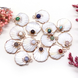 Natural shell scallop pendants with gold plated borders and colorful stone inlay