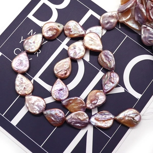 Natural baroque freshwater pearls in purple teardrop shapes for DIY jewelry making